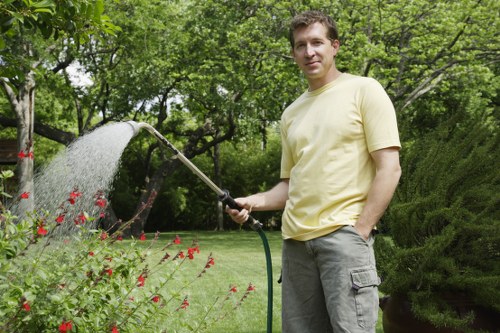 Professional technician operating a pressure washing machine