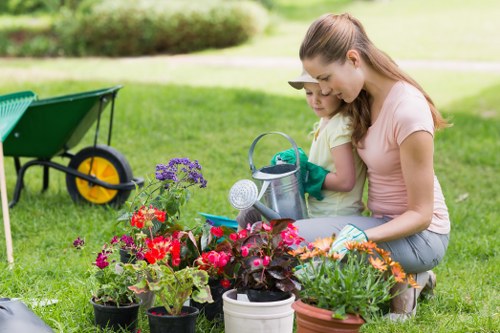 Modern pressure washing machine cleaning exterior surfaces