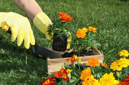 Professional setting up advanced pressure washing equipment.