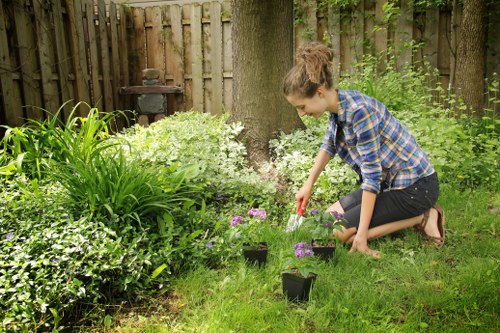 Technician operating high-pressure cleaning tools in Brockley